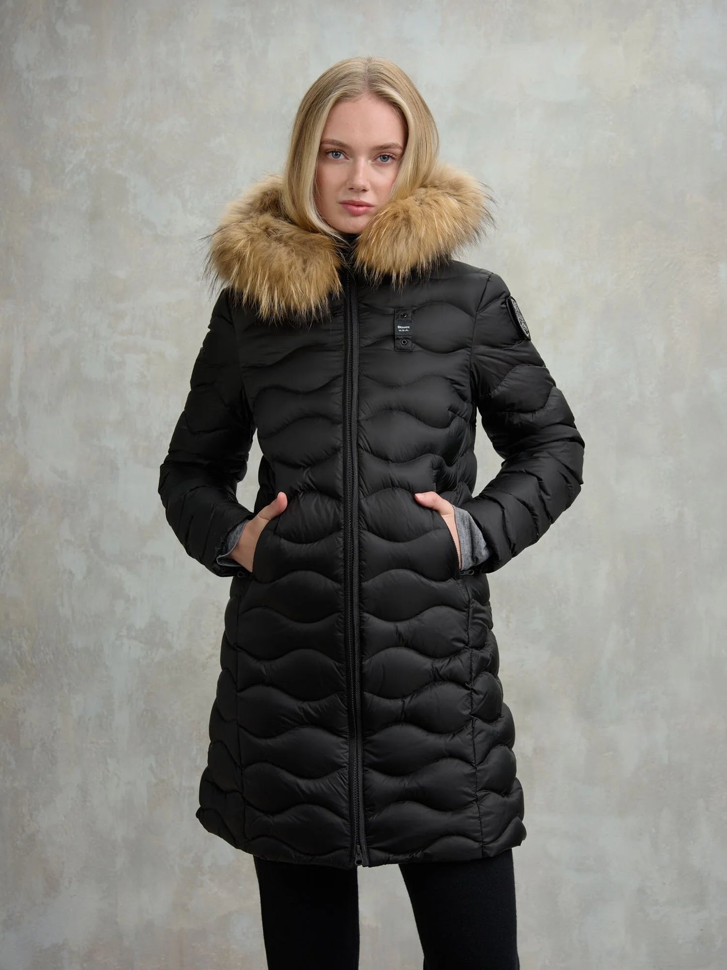 Piumino lungo ad onde con pelliccia Lynel